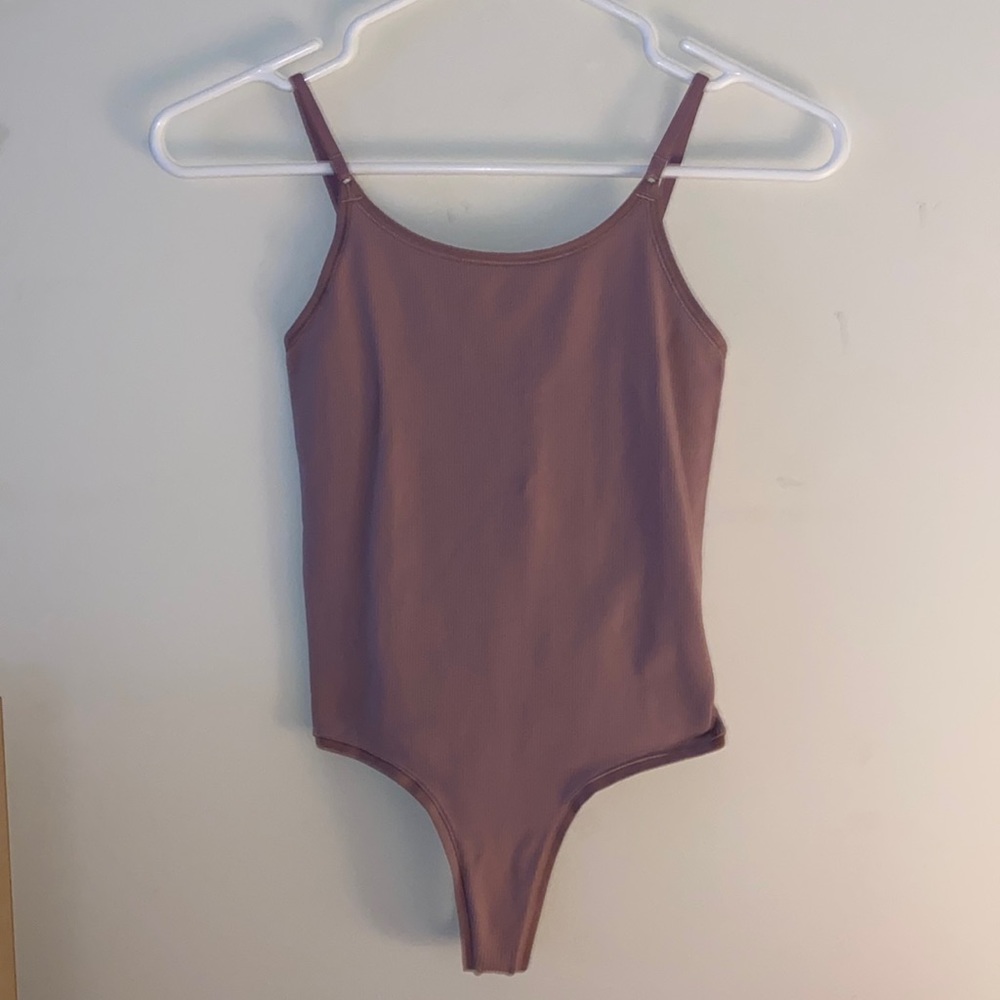 Lululemon bodysuit never worn